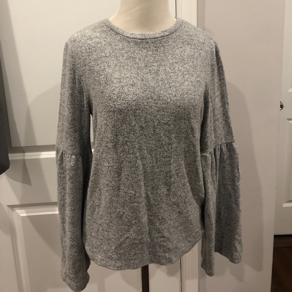 Bell sleeve fleece sweater.